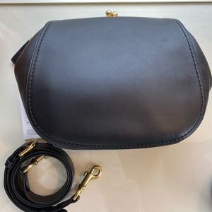 Coach black saddle bag.
